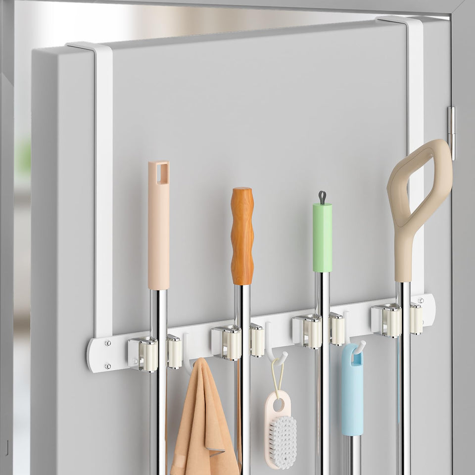 PrimZooty broom holder over door front view showing compact storage