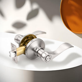 Close-up of Probrico wave-style lever in satin nickel for smooth grip.