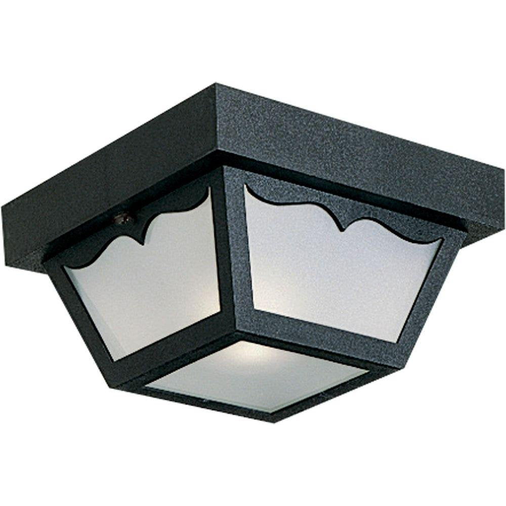 Progress Lighting flush-mount outdoor black fixture with scalloped edge enhances curb appeal on a covered porch.