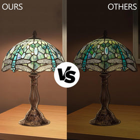 Pterying Tiffany lamp placed beside a bed for a cozy bedroom glow