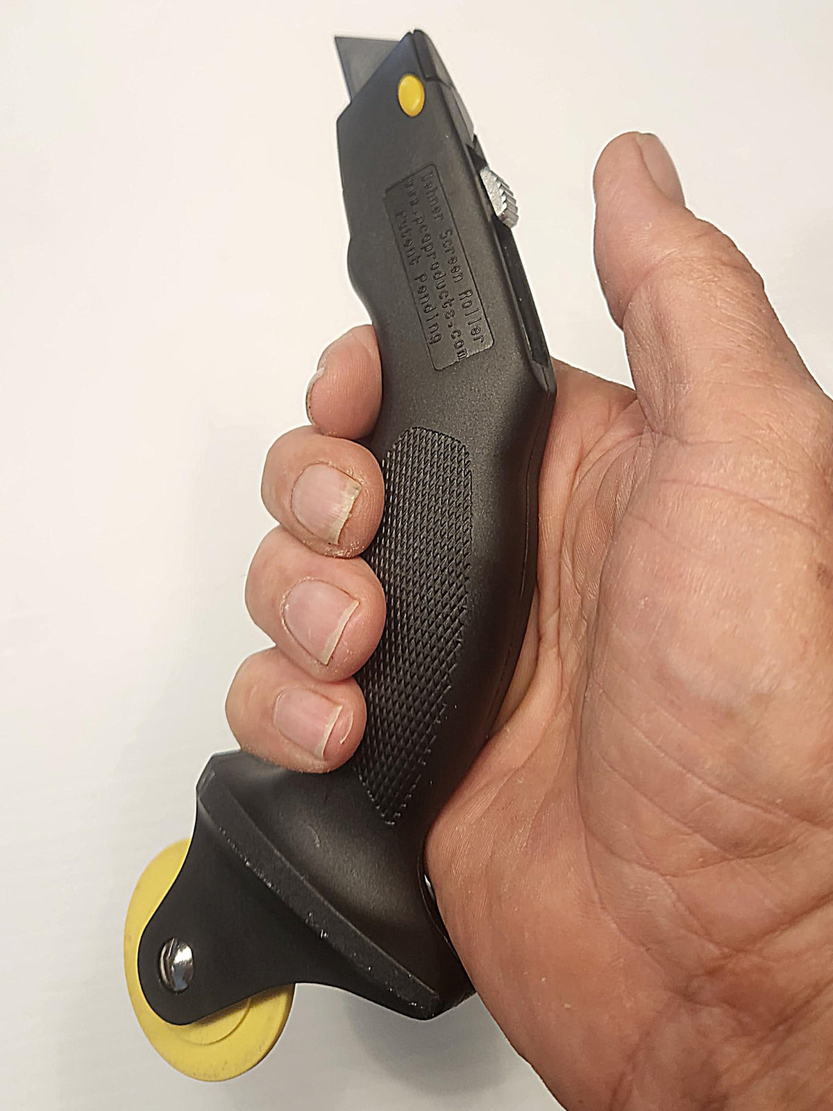 Pull A Post screen roller tool integrated blade for convenient trimming during installation.