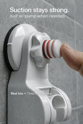 Pump&fix suction cup wall mount securing a shower head with powerful grip.