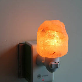 Pursalt hand-carved artisan lamp showcases natural craftsmanship.