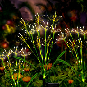 Putuzmic solar garden lights with 6-branch firework design illuminate outdoor walkways.