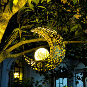 QCF solar garden moon light crescent on tree provides warm decorative illumination