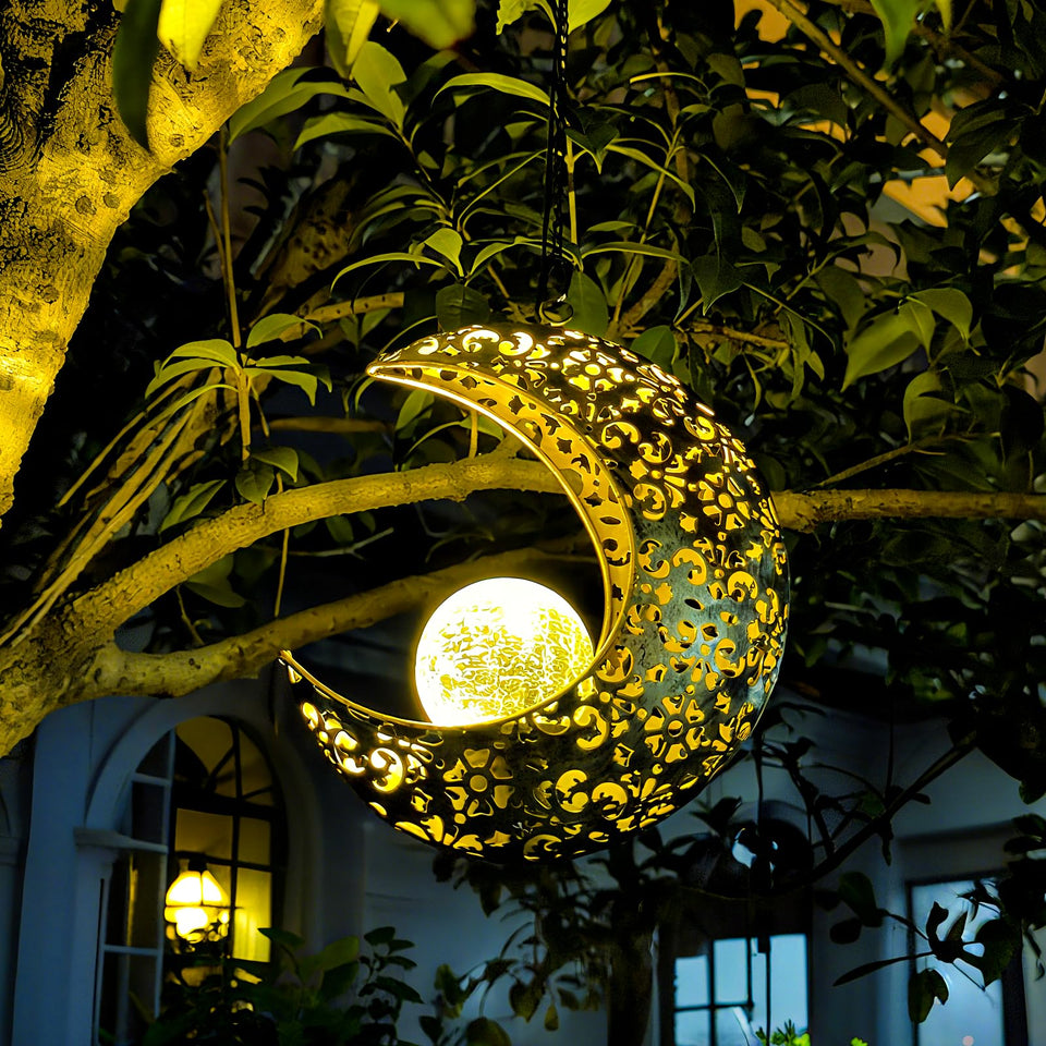 QCF solar garden moon light crescent on tree provides warm decorative illumination