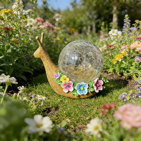 QCF Solar Snail garden light showing textured resin body for outdoor durability