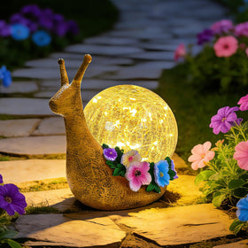 QCF Solar Snail statue with cracked glass globe, warm outdoor glow for garden decor