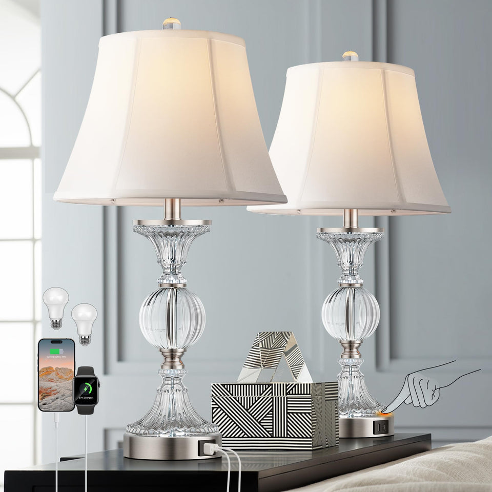 QiMH glass table lamp with silver base provides soft ambient light for living rooms.