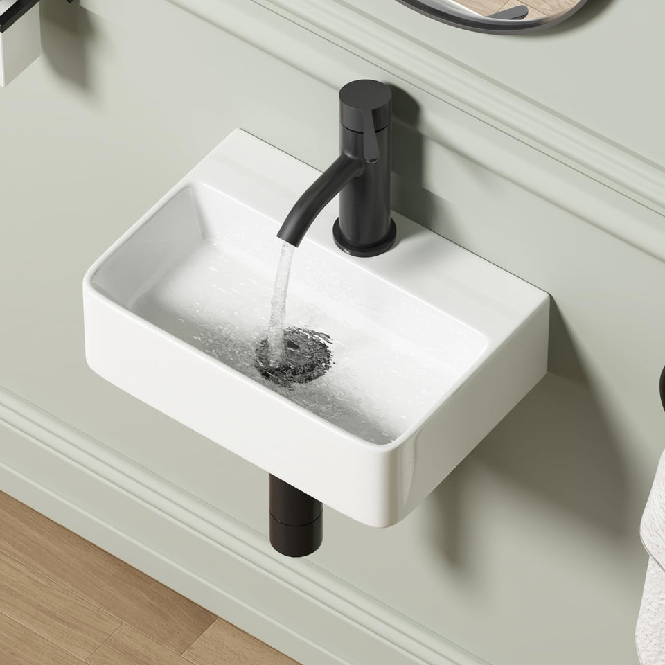 QISHKA wall-hung rectangular sink 14.5x10, space-saving for compact bathrooms.