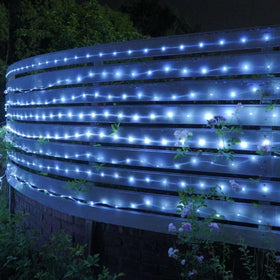 QITONG bendable rope light shapes along fence for festive glow.