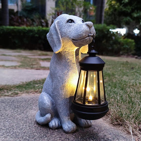 Qobumy solar dog garden statue front view with warm lantern glow