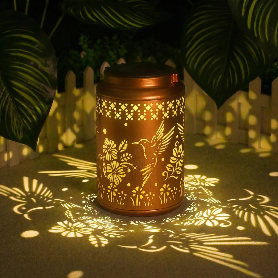 QPPDER hummingbird solar lantern with gold finish for outdoor evenings