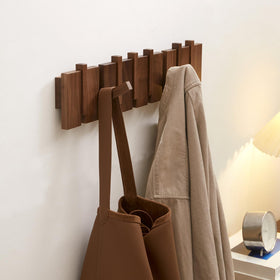 QUELLANCE flip-down hooks save space and keep entryways neat.