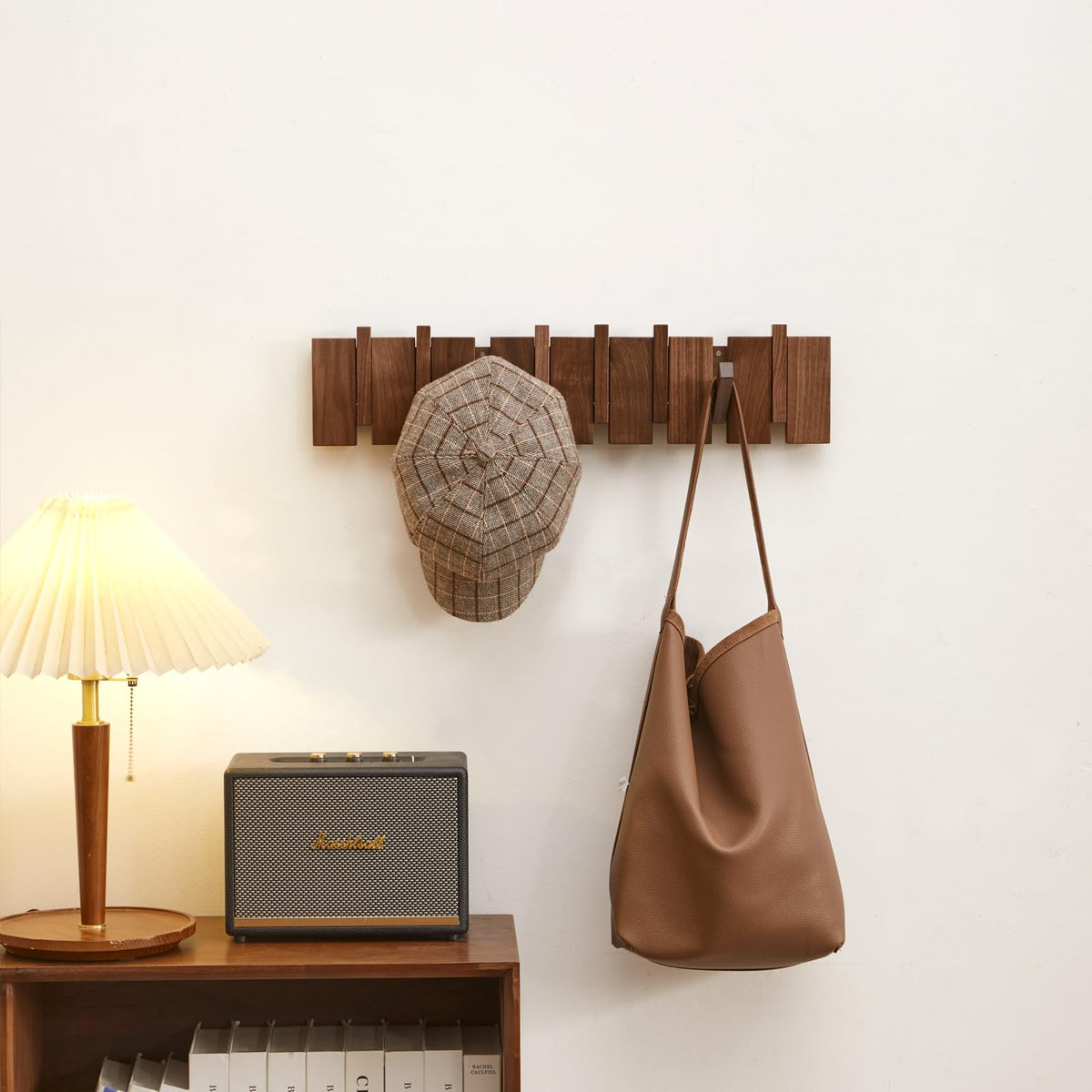QUELLANCE solid wood coat hanger delivers durable, long-lasting organization.