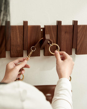 QUELLANCE coat rack in hallway keeping coats neatly hung