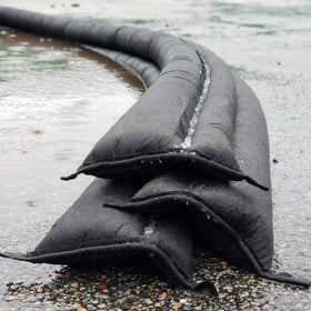 Quick Dam water activated barrier expands on contact for containment