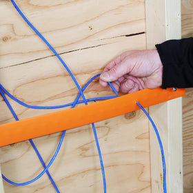 Poke-E helps prevent nails from contacting cables behind drywall.
