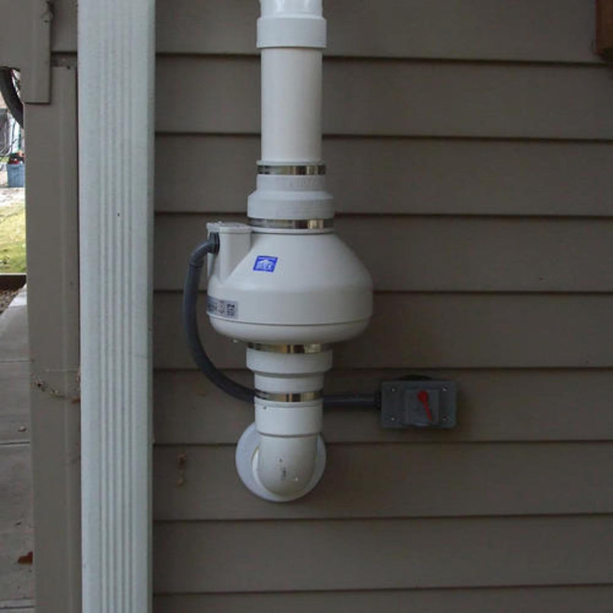 RadonAway RP145C 4.5-inch inlet/outlet detail for retrofit-ready design.
