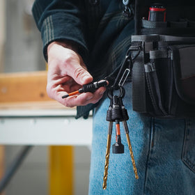 Railer extension bar design minimizes space while keeping bits handy.