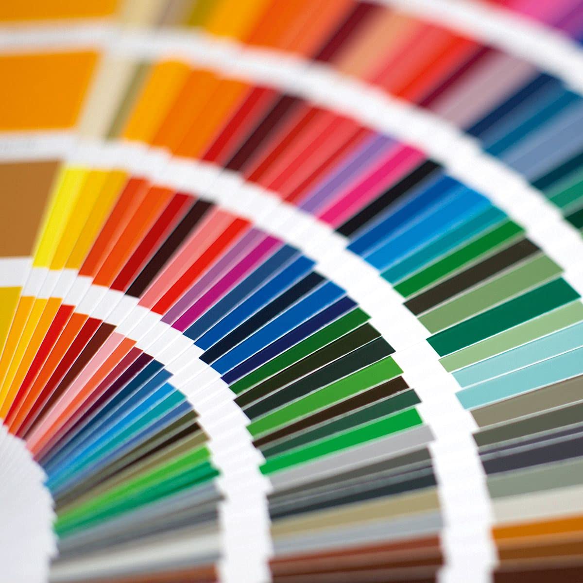 Close-up of RAL K7 swatches highlighting broad hue range for on-site design decisions