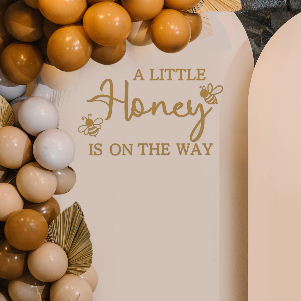 Ramciyo A Little Honey Is On The Way gender reveal setup with bee decor.