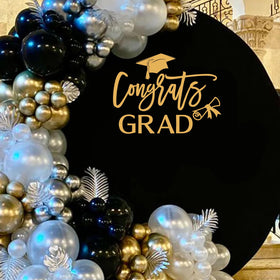 Ramciyo Congrats Grad sign with gold letters stands out against light backgrounds