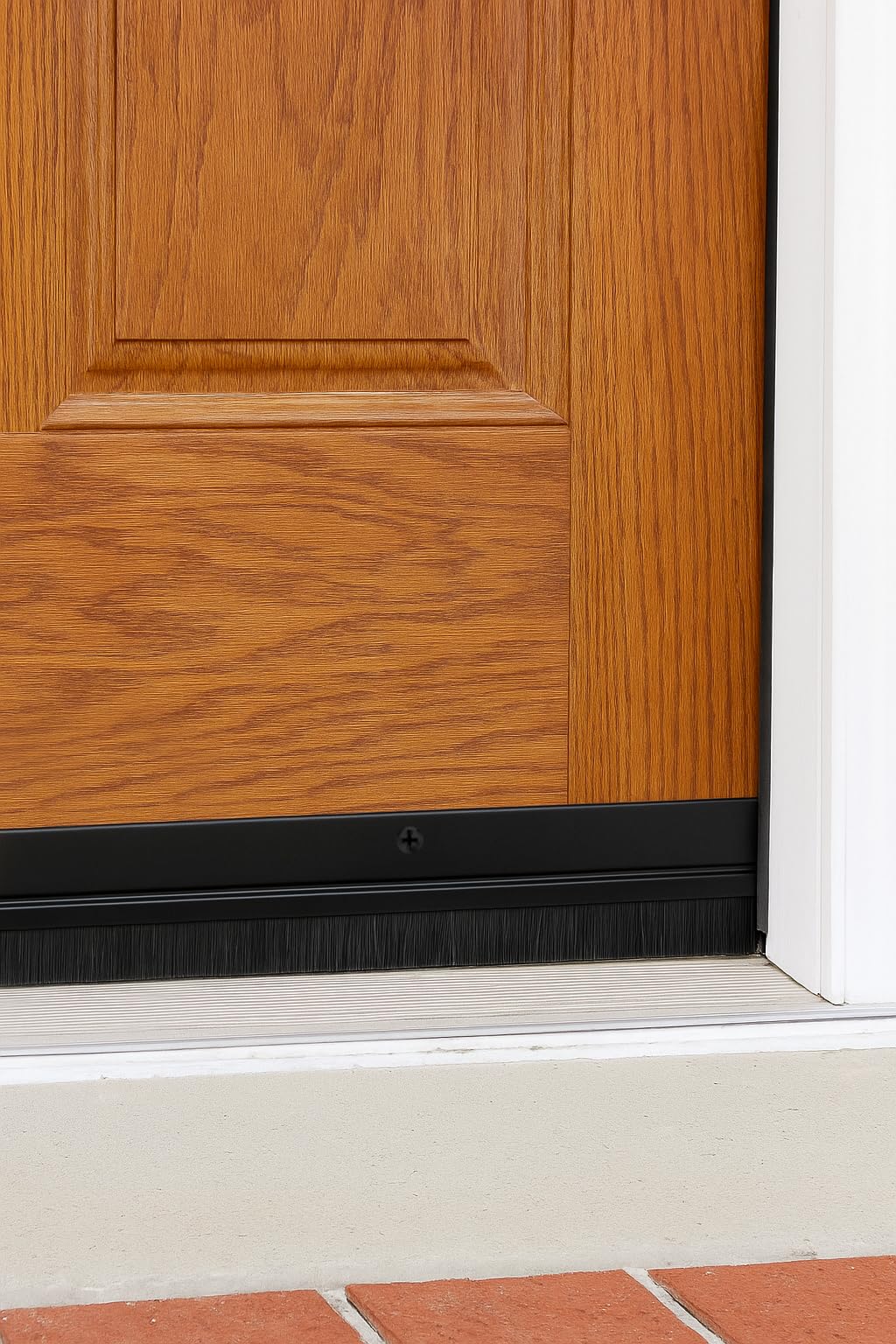 Randall door sweep brush is attached to the holder, no crimping required.