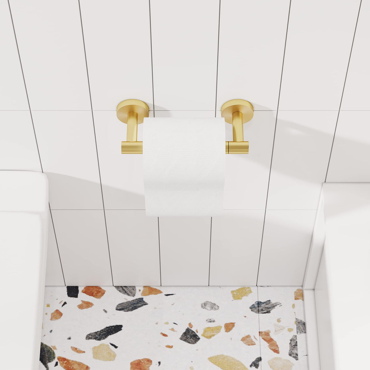 RARXTR wall-mounted tissue holder in brushed brass elevates decor and durability.