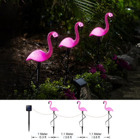 Ratopo pink flamingo garden light adds whimsical night ambiance.