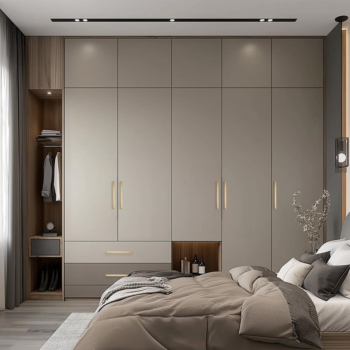 Ravinte champagne bronze finish complements nickel appliances in modern kitchens.