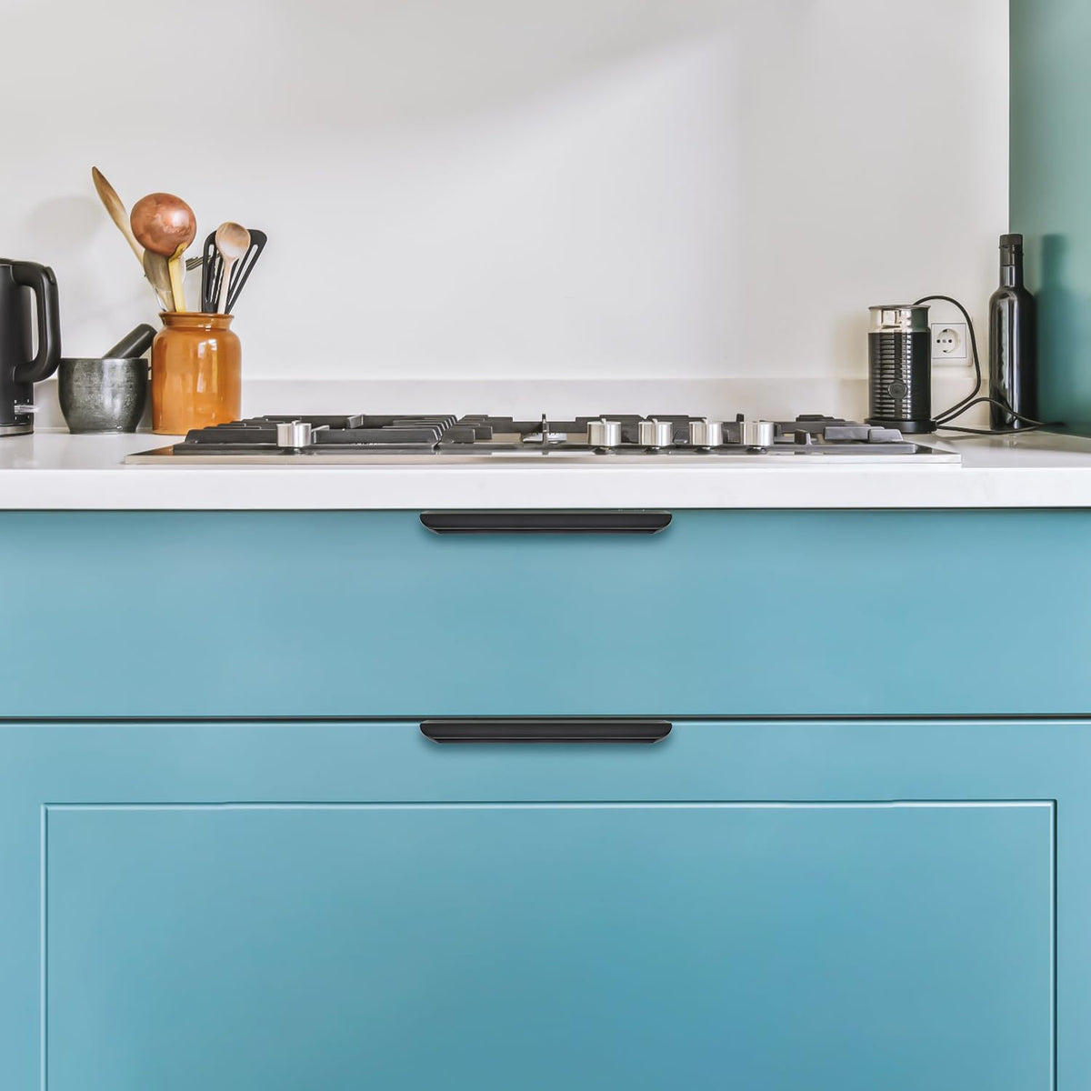 Ravinte black finger pulls installed on modern furniture detail