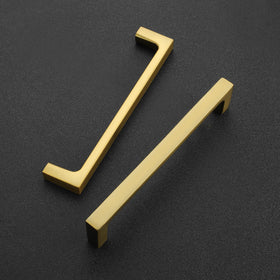 Ravinte brushed brass 5-inch drawer pull enhances style and smooth operation.