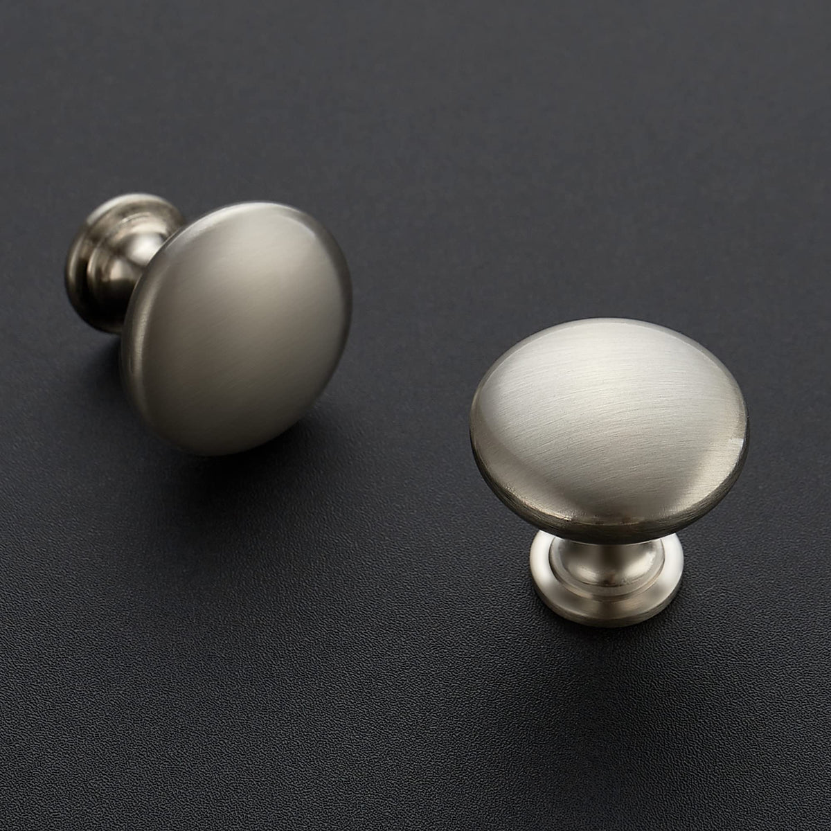 Ravinte brushed nickel round cabinet knob on drawer front adds modern bathroom vanity appeal.