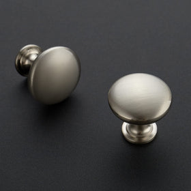 Ravinte brushed nickel round cabinet knob on drawer front adds modern bathroom vanity appeal.