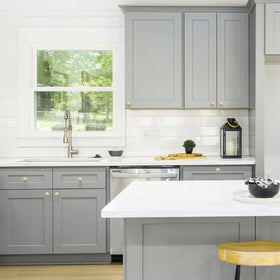 Ravinte Champagne Bronze knob finish detail emphasizes the warm, soft glow.