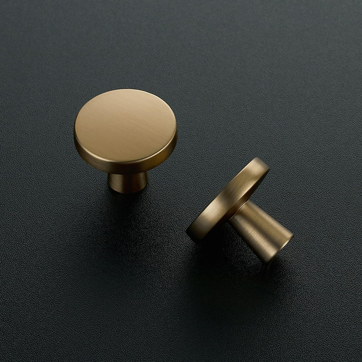 Ravinte Champagne Bronze knob installed on a cabinet for a cohesive kitchen look