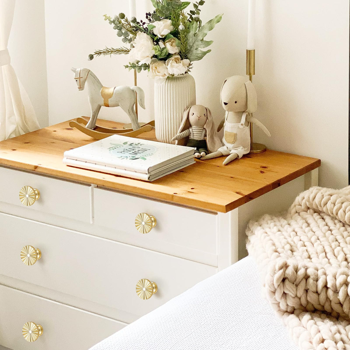 Ravinte Decor round base knob on drawer front suggests timeless vintage appeal and smooth operation
