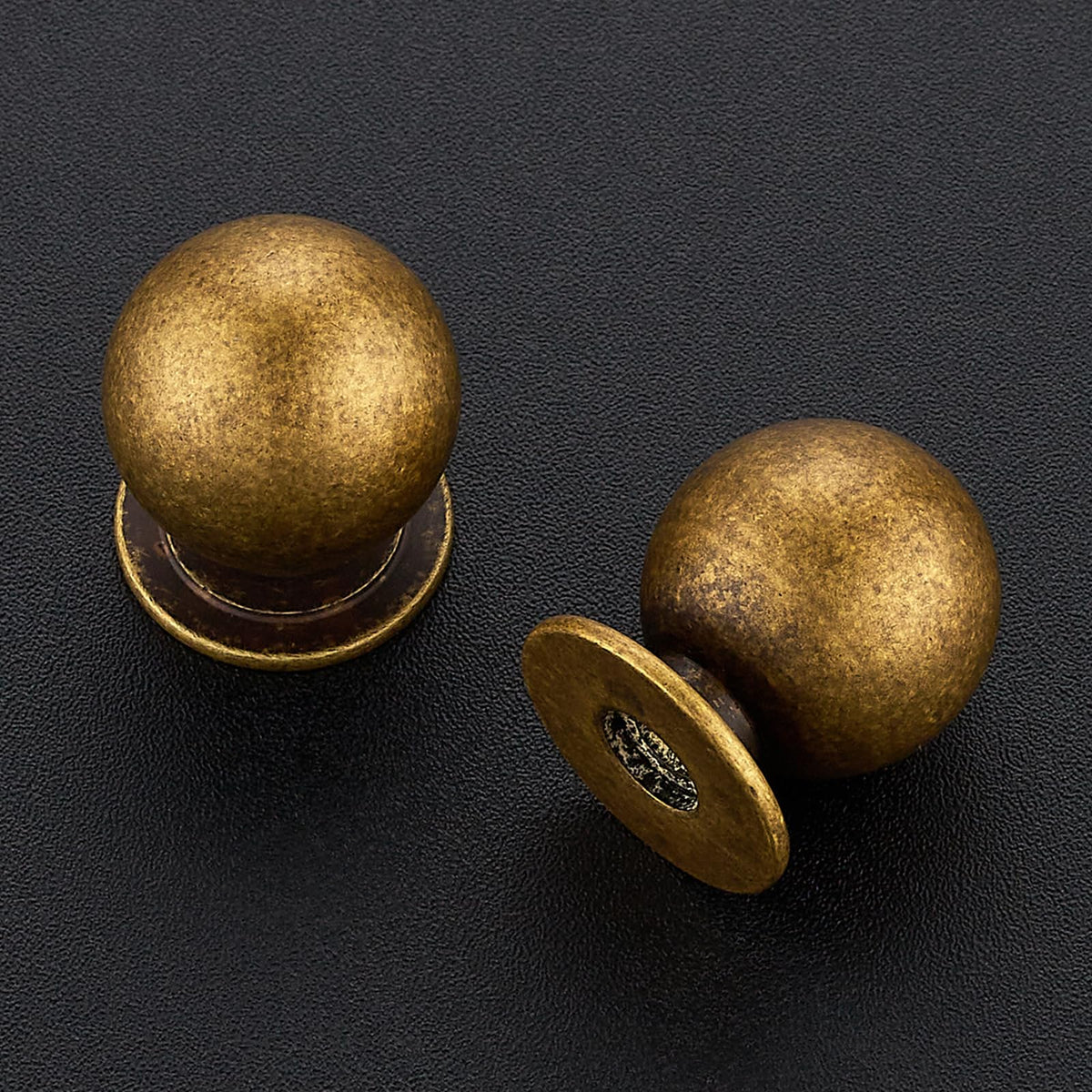 Ravinte Decor round knob in black provides sleek contrast for modern furniture
