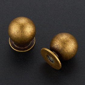 Ravinte Decor round knob in black provides sleek contrast for modern furniture