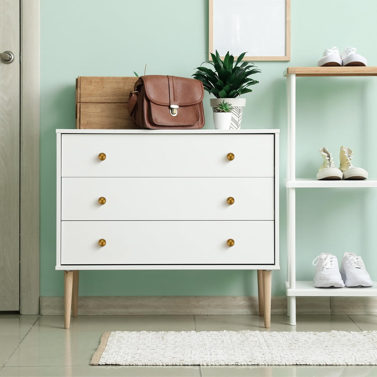 Ravinte Decor round knob in brushed brass adds a soft, inviting glow