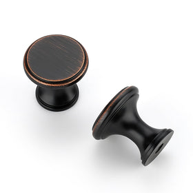 Ravinte bronze knob on a drawer highlights storage with elegance.