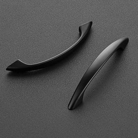 Ravinte matte black cabinet handle mounted on a drawer for a sleek look.