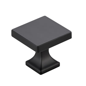 Ravinte matte black square knob closeup on cabinet door with durable finish