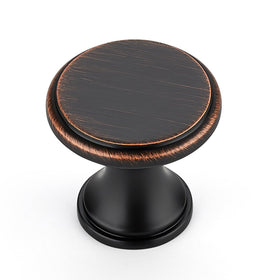 Ravinte oil-rubbed bronze knob on cabinet enhances kitchen style.