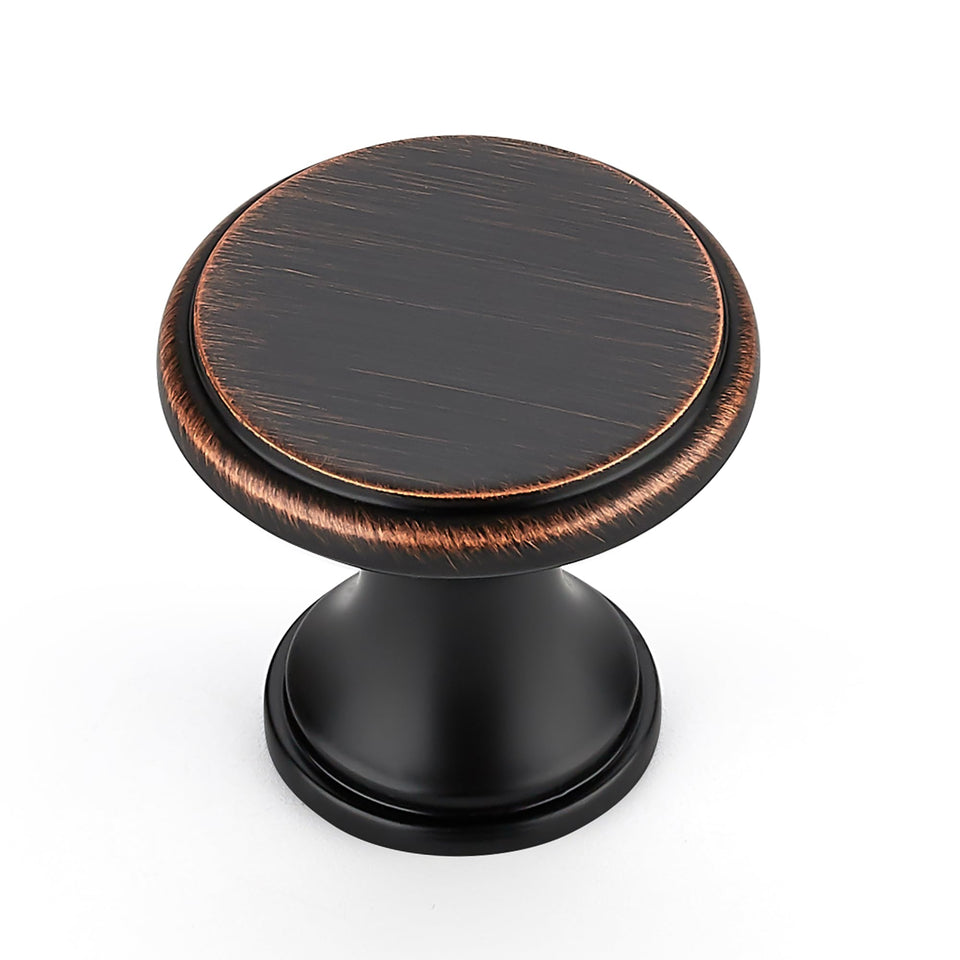 Ravinte oil-rubbed bronze knob on cabinet enhances kitchen style.