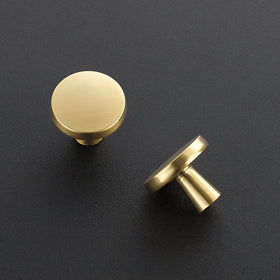 Ravinte gold brushed brass knobs during kitchen installation with included tools