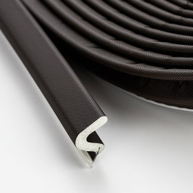 Ravinte weather-stripping door seal in brown blocks drafts and improves comfort at the doorway