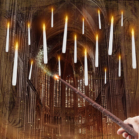 Raycare floating candles with wand remote illuminate a magical dinner table setting.