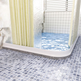 Raycity transparent 3-inch high shower dam offers minimal visual impact.